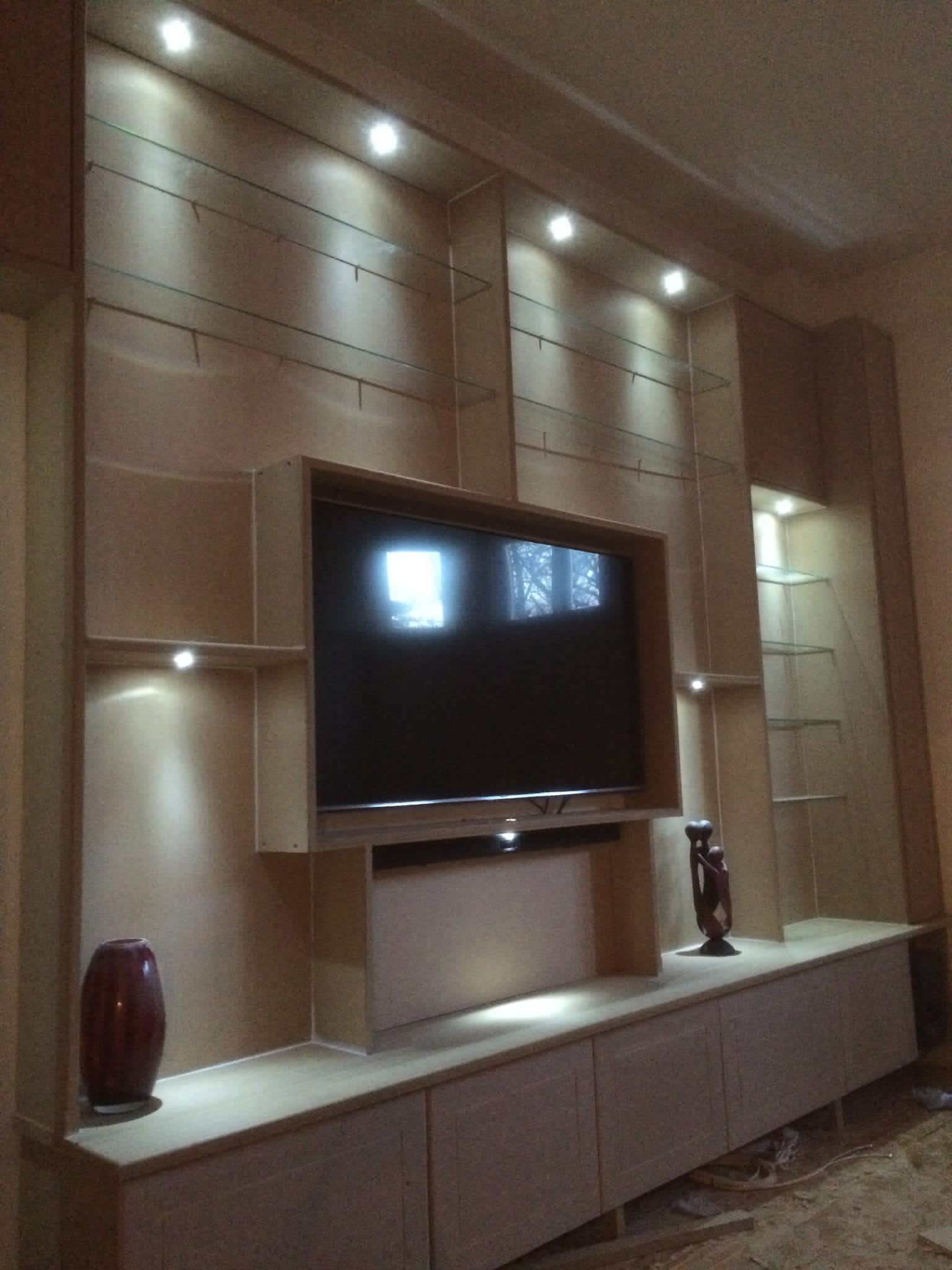 Display lighting fitted to a TV and shelving unit by CAN Electrical Contractors Limited