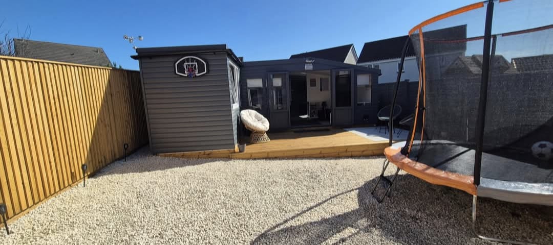 Garden summerhouse with new gravel and fencing, work by JV Handyman & Garden Services