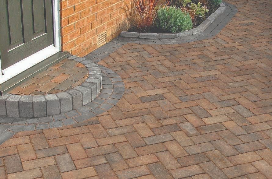 Curved step and entrance laid in multitone block paving