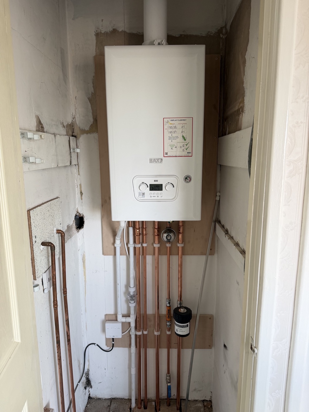 Close-up detail of a boiler installation by Derek Stuart Heating & Gas