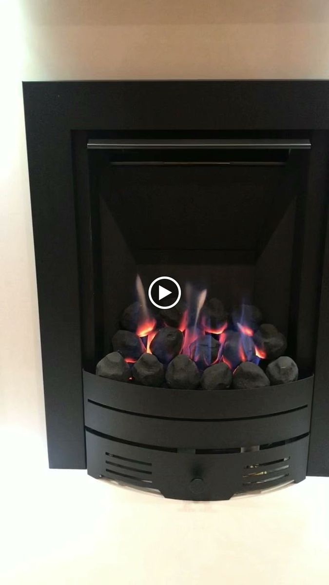 Lit gas fire in a living room after one of our installations