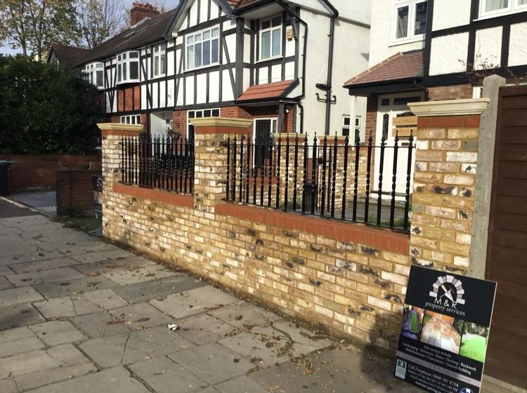 Our finished brick front wall with iron railings on a Victorian property