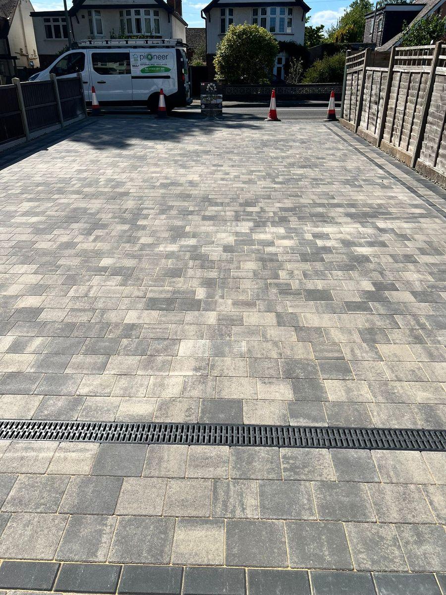 Large block paving driveway with drainage channel