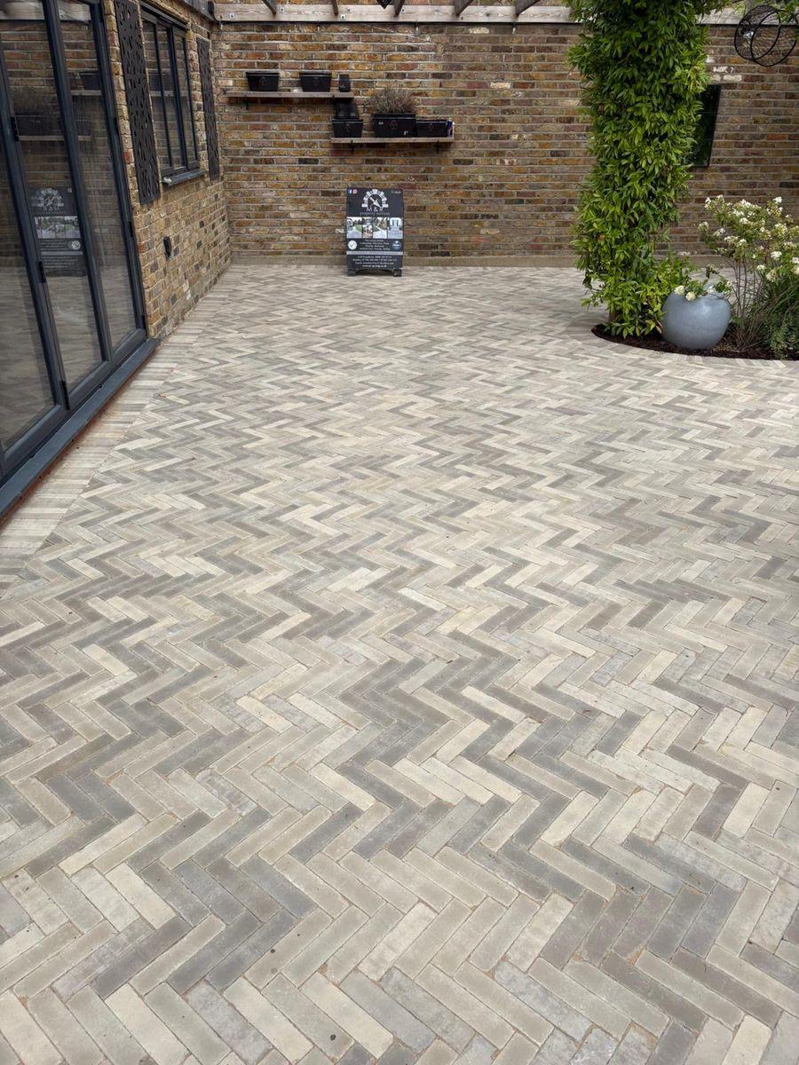Herringbone block paving courtyard patio