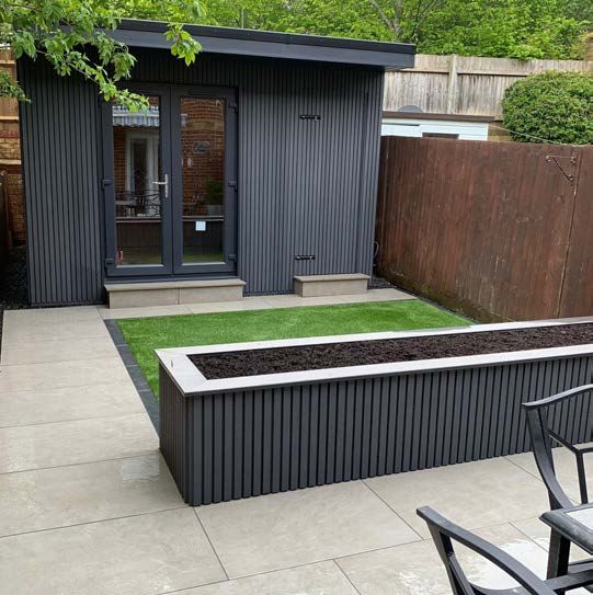 Garden transformation with porcelain paving and a garden room
