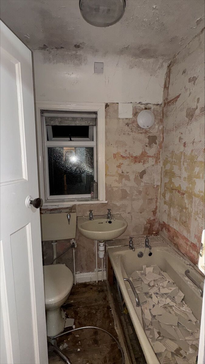 Before photo for Complete bathroom refit with walk-in shower, vanity unit, and new flooring